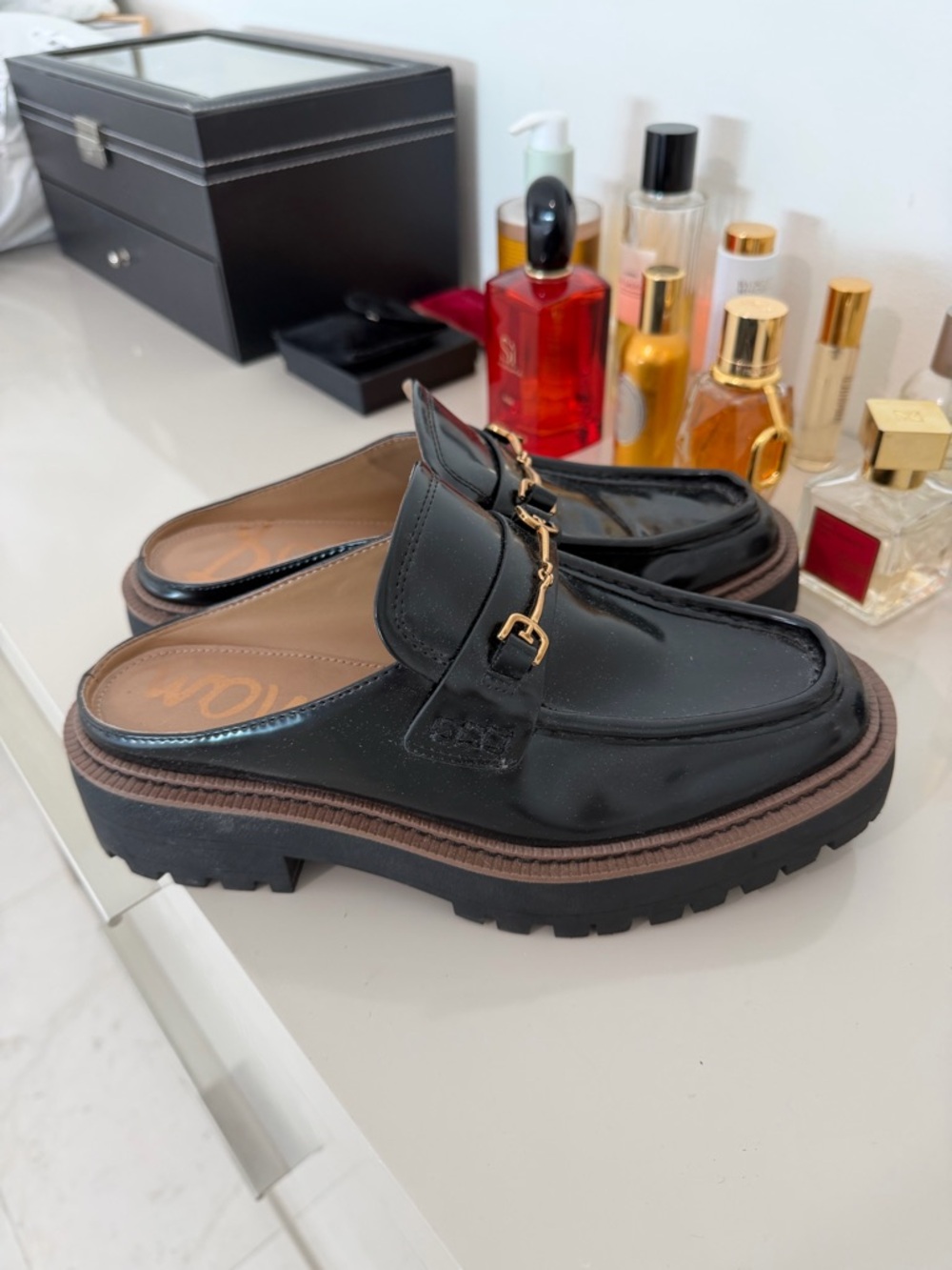 Black Leather Slip-On Loafers with Gold Hardware